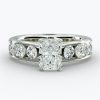 Radiant shape diamond, with smaller channel set diamonds on 3 sides Engagement ring