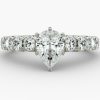 Pear diamond, with smaller prong set diamonds Engagement Ring