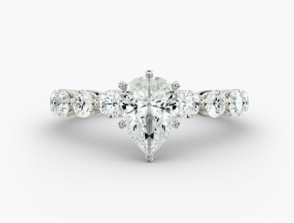 3 carat Pear diamond, with smaller diamonds individually mounted Engagement Ring