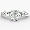 Radiant diamond, with smaller prong set complimenting diamonds Engagement ring