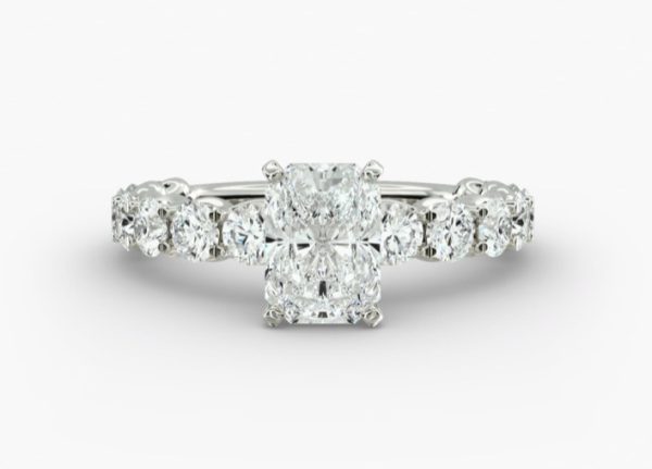 Radiant diamond, with smaller prong set complimenting diamonds Engagement ring
