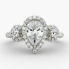 3 carat Pear solitaire, in a halo design with smaller 2 diamonds on the sides, and diamonds on the shanks Engagement Ring