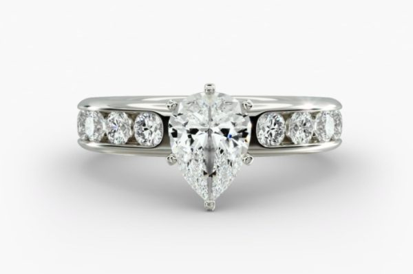 3 carat Pear shape centre stone, with channel set diamonds Engagement Ring