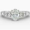 3 carat Oval shape diamond, with channel set smaller diamonds Engagement ring