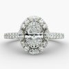 3 carat Oval shape diamond, halo design with channel set smaller diamonds Engagement ring