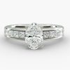 3 carat Oval shape diamond, with prong set smaller diamonds Engagement Ring
