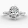 3 carat Oval shape diamond, with an immaculate halo design and 3 sided shanks with diamonds.