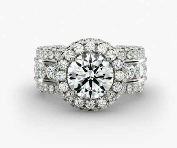 Halo design with a 3 row diamond shank Engagement Ring
